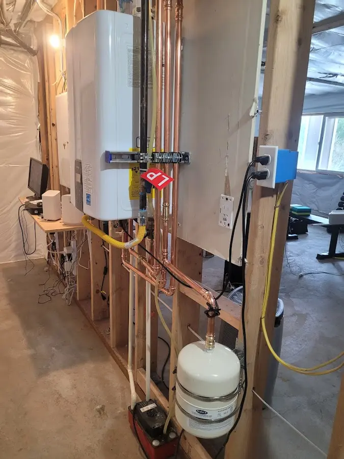 Licensed plumber repairing a kitchen sink in Azle